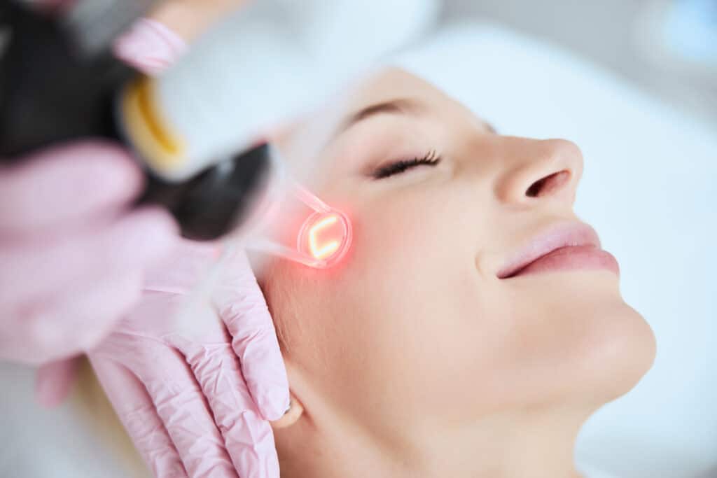 Young woman receiving laser treatment